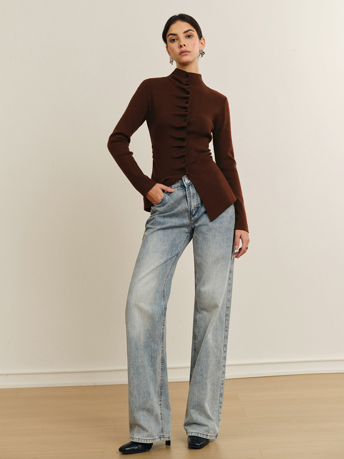 Women's fitted cardigan with a mock neck and pleated button front