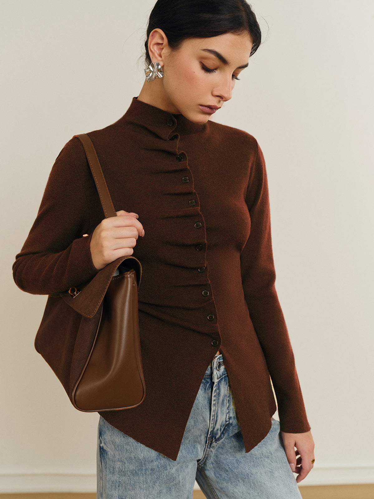 Women's fitted cardigan with a mock neck and pleated button front