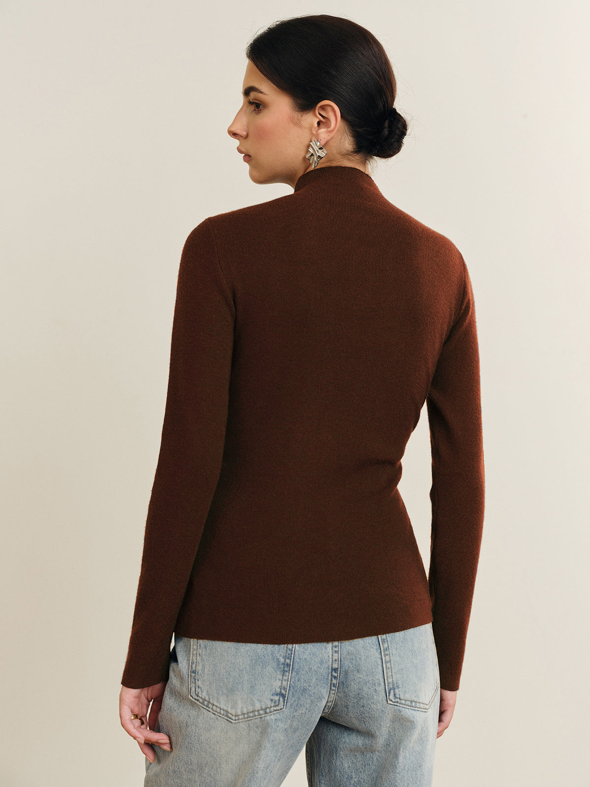 Women's fitted cardigan with a mock neck and pleated button front