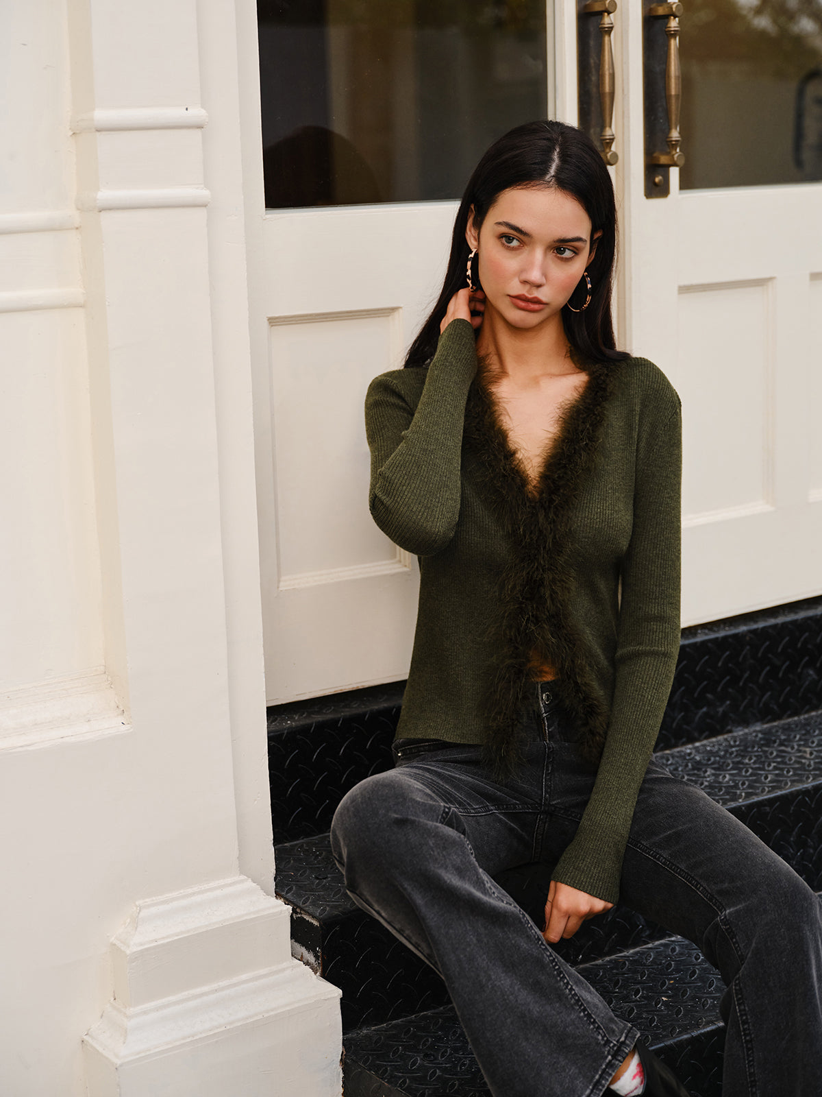 Women's fitted rib knit cardigan with a V-neck and fluffy trim