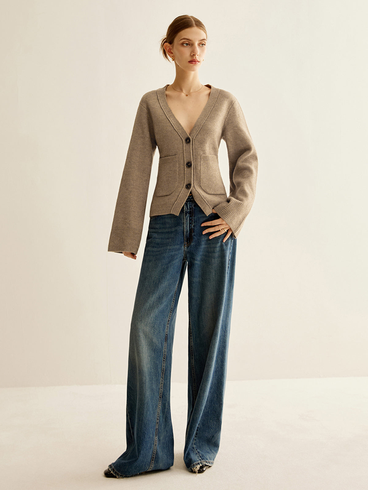 Women's fitted V-neck cardigan with flared sleeves and patch pockets
