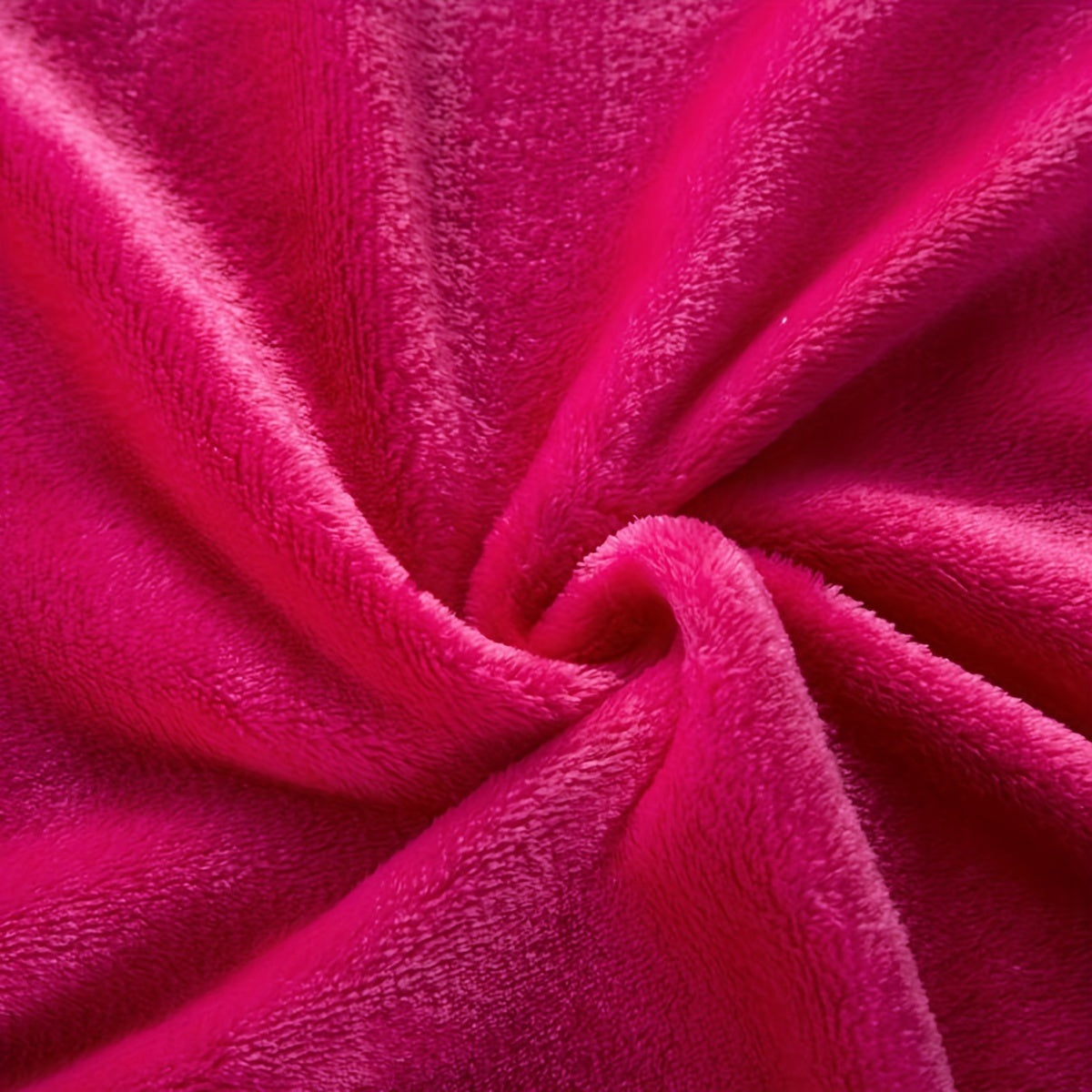 Plain flannel fleece blanket over a bed - view 2