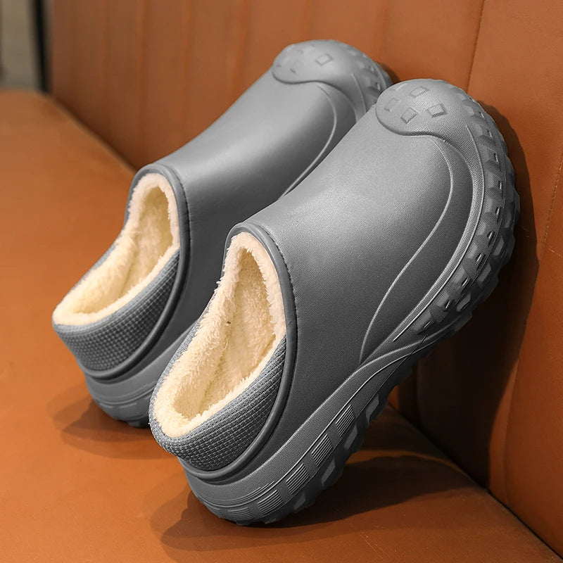 Fleece-lined EVA slippers with a smooth shell and a chunky block tread sole