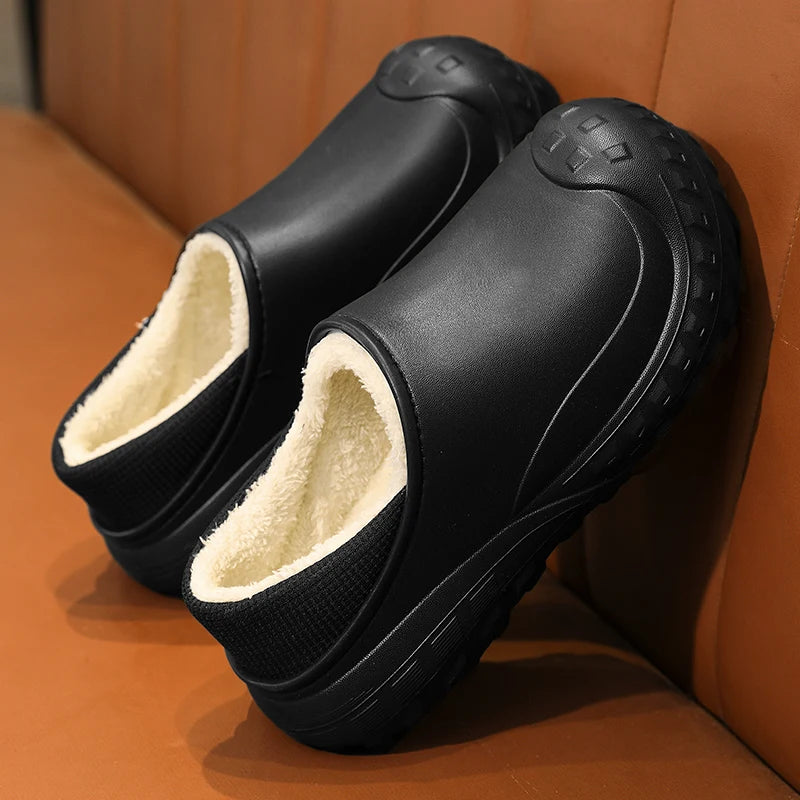 Fleece-lined EVA slippers with a smooth shell and a chunky block tread sole - black
