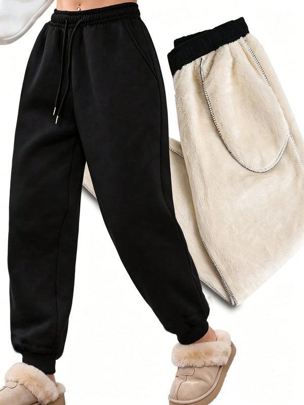Fleece lined joggers for women with a teddy lining and drawstring - black