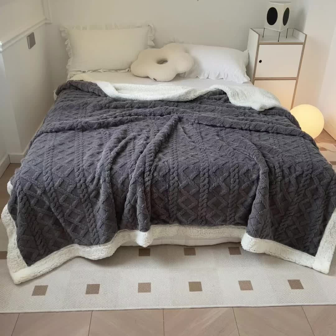 Reversible fleece throw with a cable pattern and sherpa back - view 2