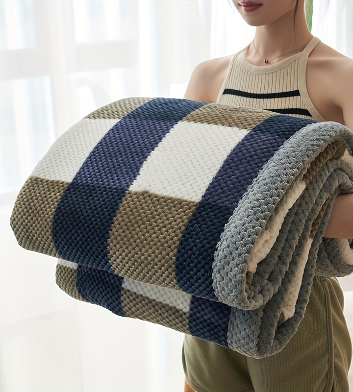 Fleece throw with a check pattern and waffle texture - navy check