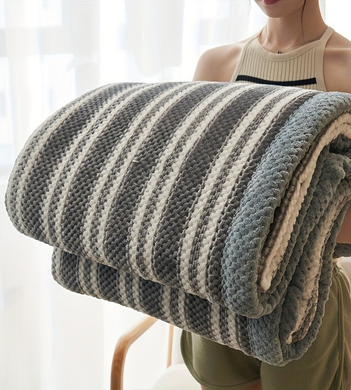 Fleece throw with a check pattern and waffle texture - grey stripe