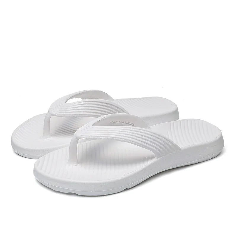EVA flip flops with a thick sole, ribbed strap and a footbed with diagonal ridges - view 5