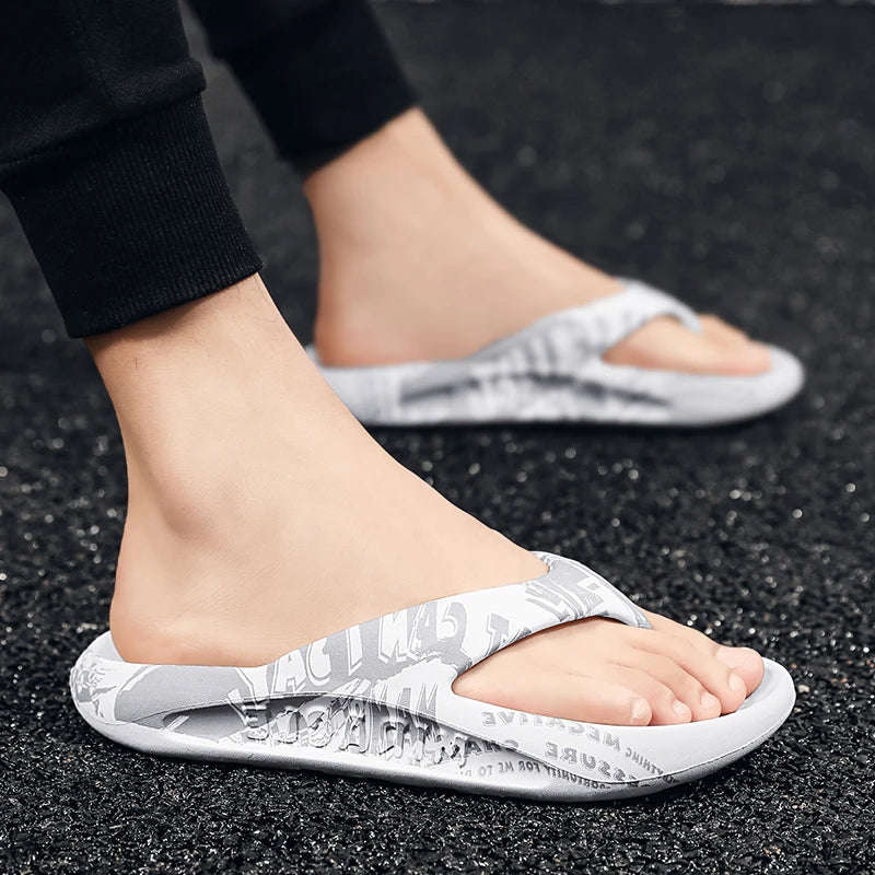Flip flops in EVA with thick sole and letter print across straps and footbed - view 3
