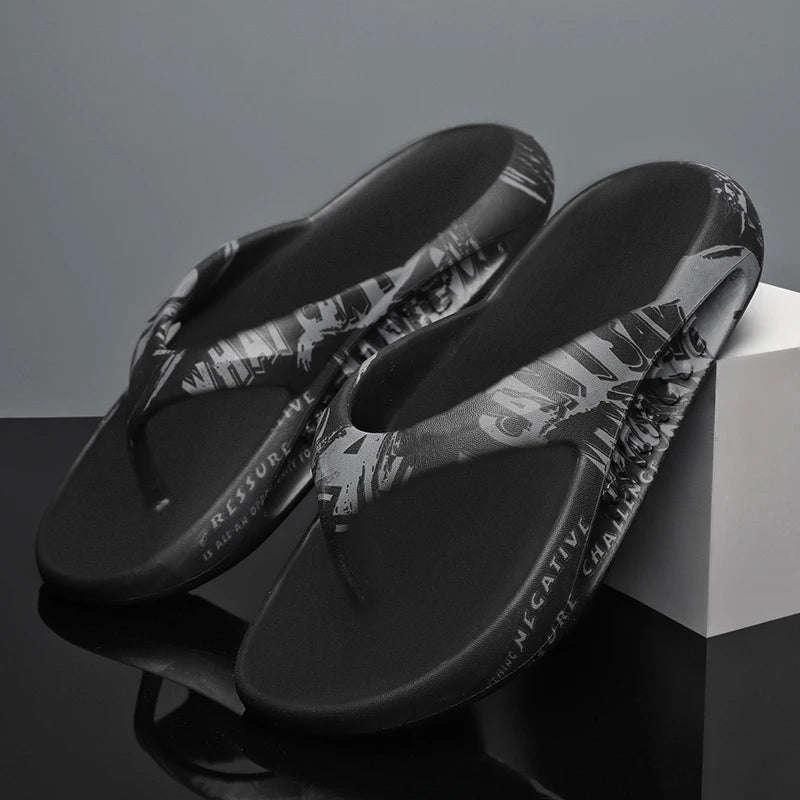 Flip flops in EVA with thick sole and letter print across straps and footbed - black