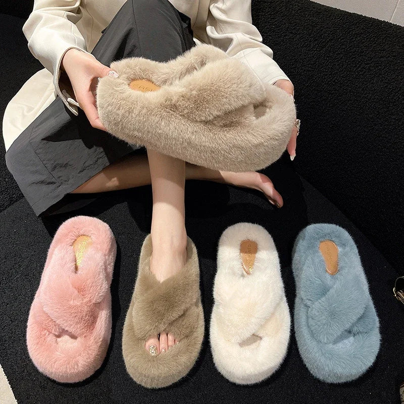Slippers with crossed faux fur straps and a thick platform sole covered in plush