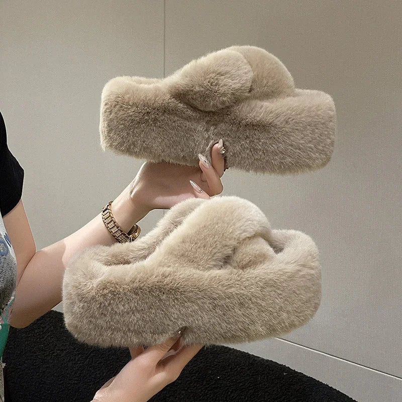 Slippers with crossed faux fur straps and a thick platform sole covered in plush - view 2