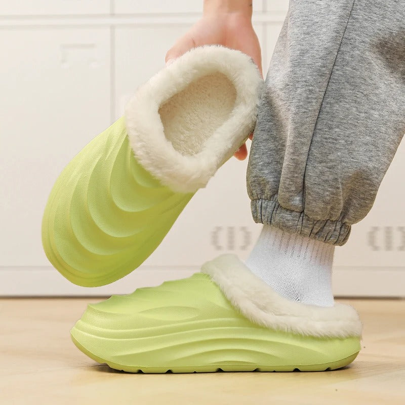 Fluffy slippers with a wave-pattern EVA shell, plush collar and thick sole