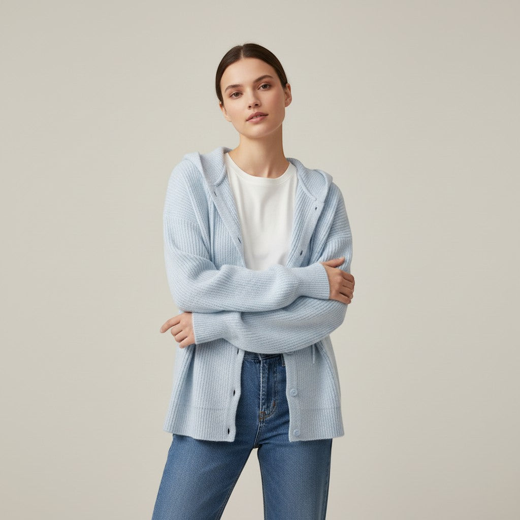 Soft hooded knit cardigan with a button front and dropped shoulders in light blue