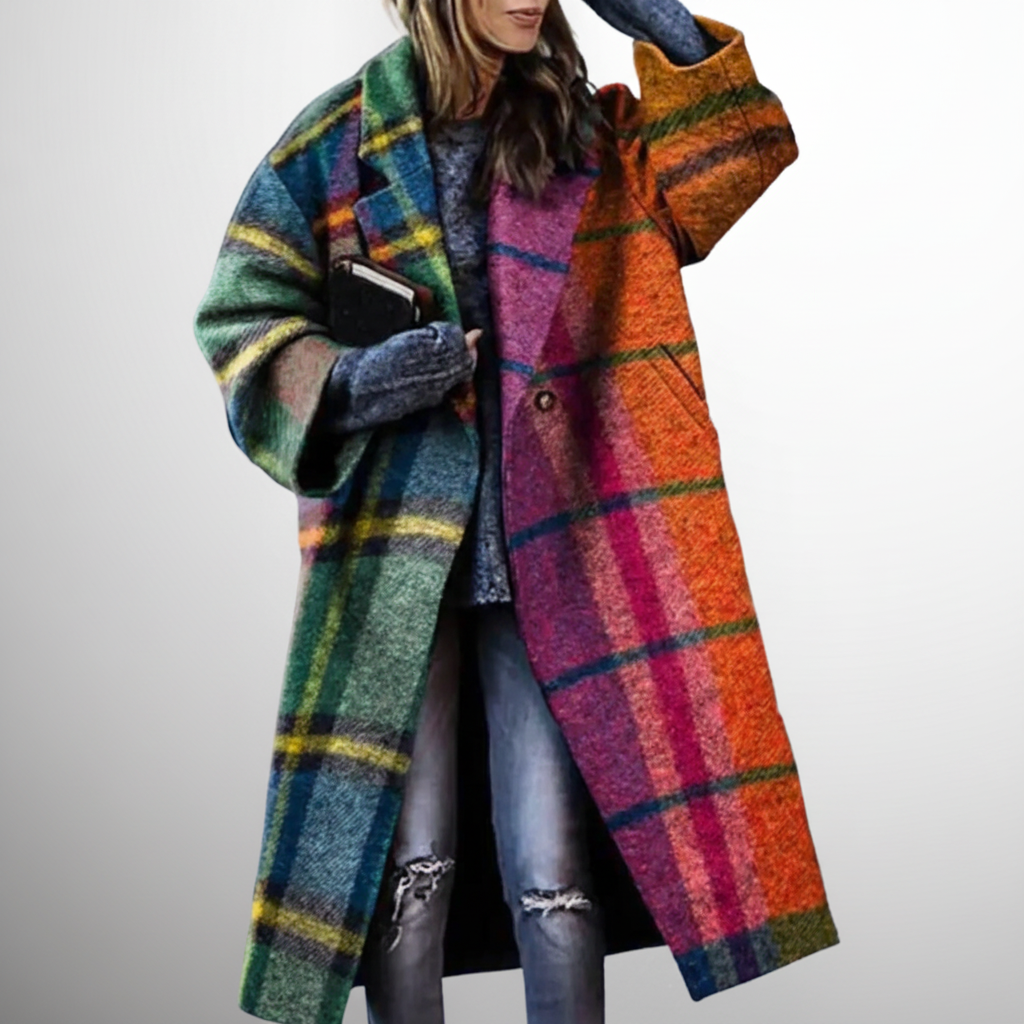Longline multicolour plaid coat with a lapel collar, worn open over a grey jumper
