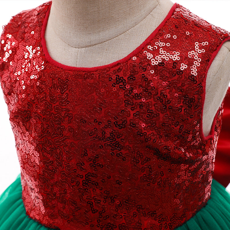 Girls' Christmas party dress with a sequinned bodice, tulle skirt and big bow