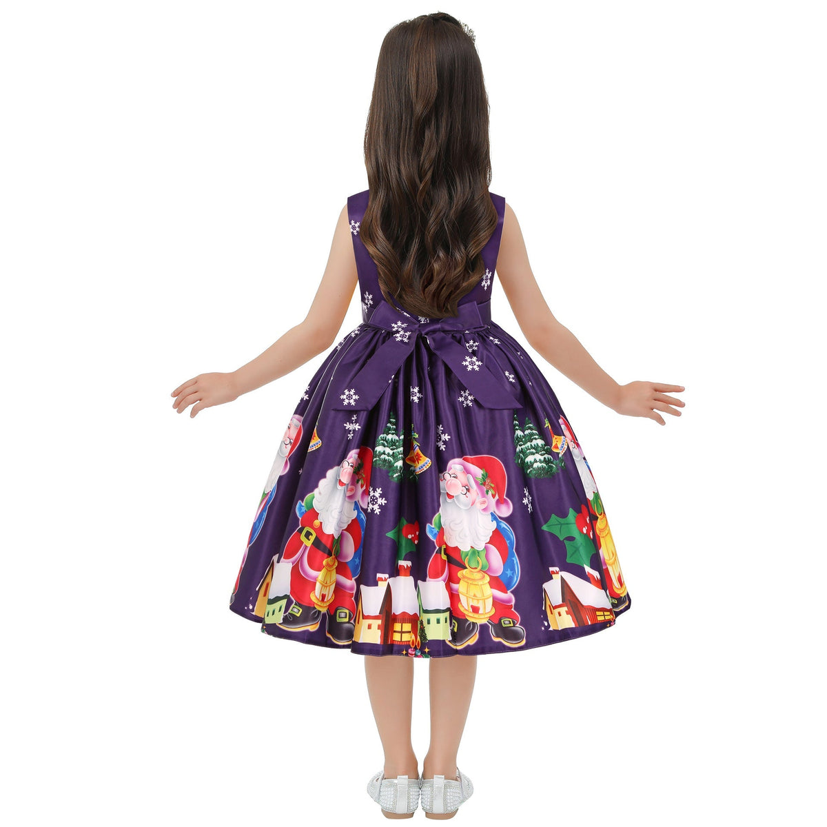 Girls' sleeveless Christmas dress with a bow and a festive print