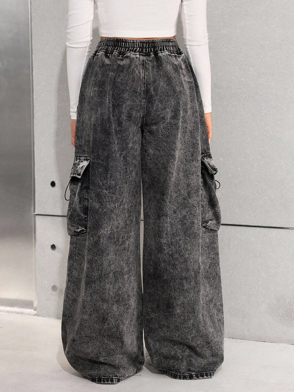 Wide leg cargo jeans for girls in stonewashed denim with drawstring waist and flap pockets - washed black