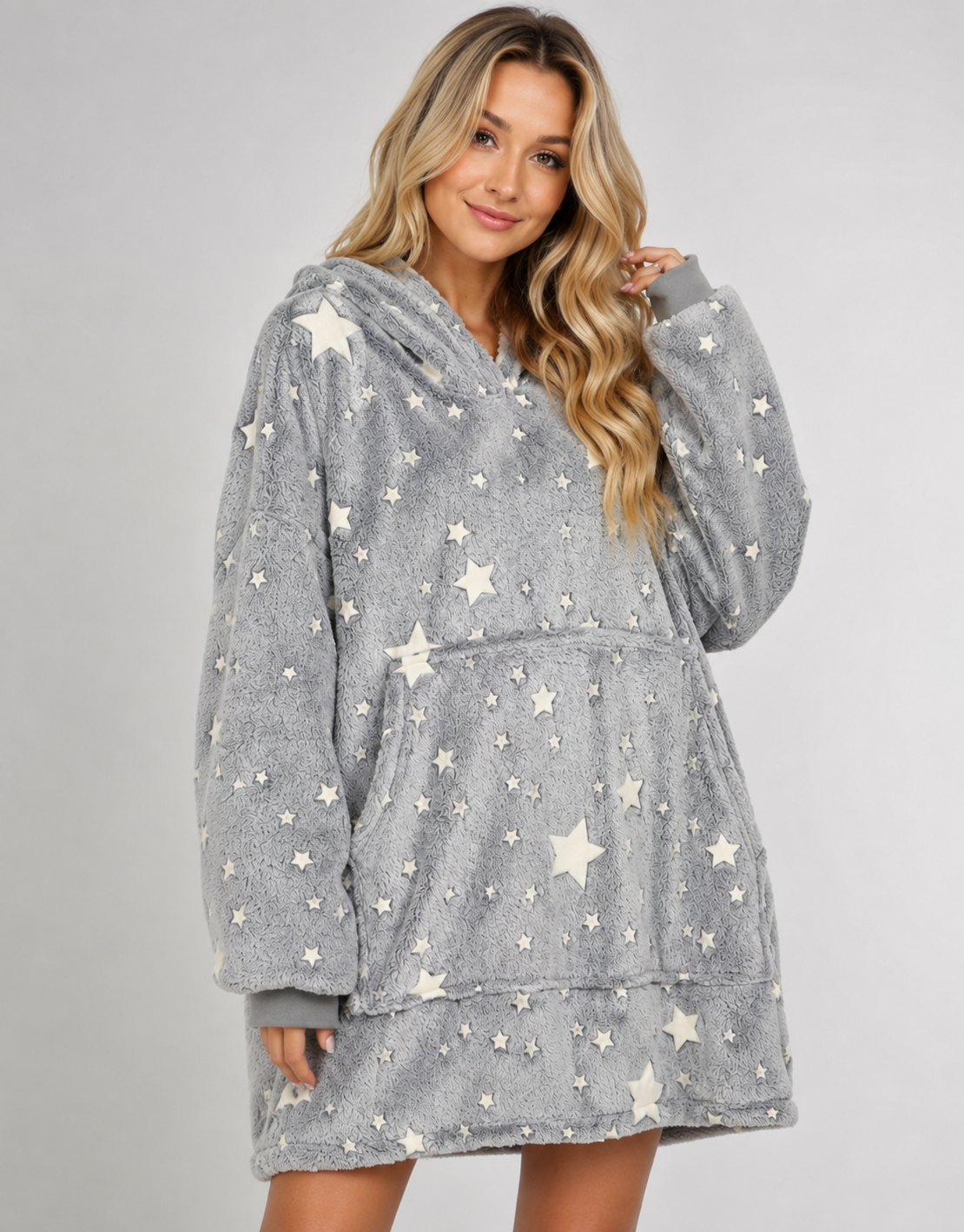 Grey oversized blanket hoodie covered in stars that glow in the dark