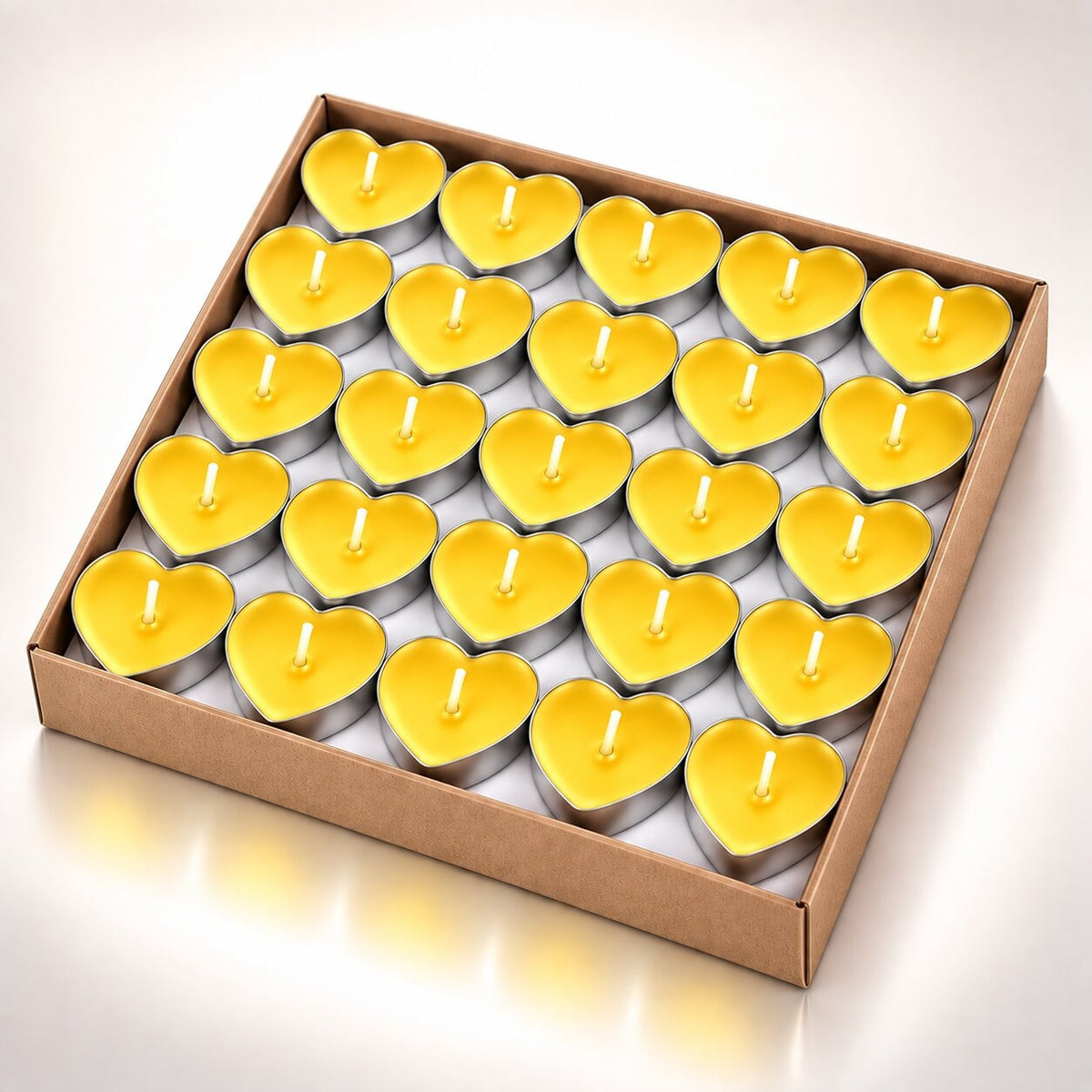 Coloured heart-shaped and round tea lights in cardboard boxes - view 12