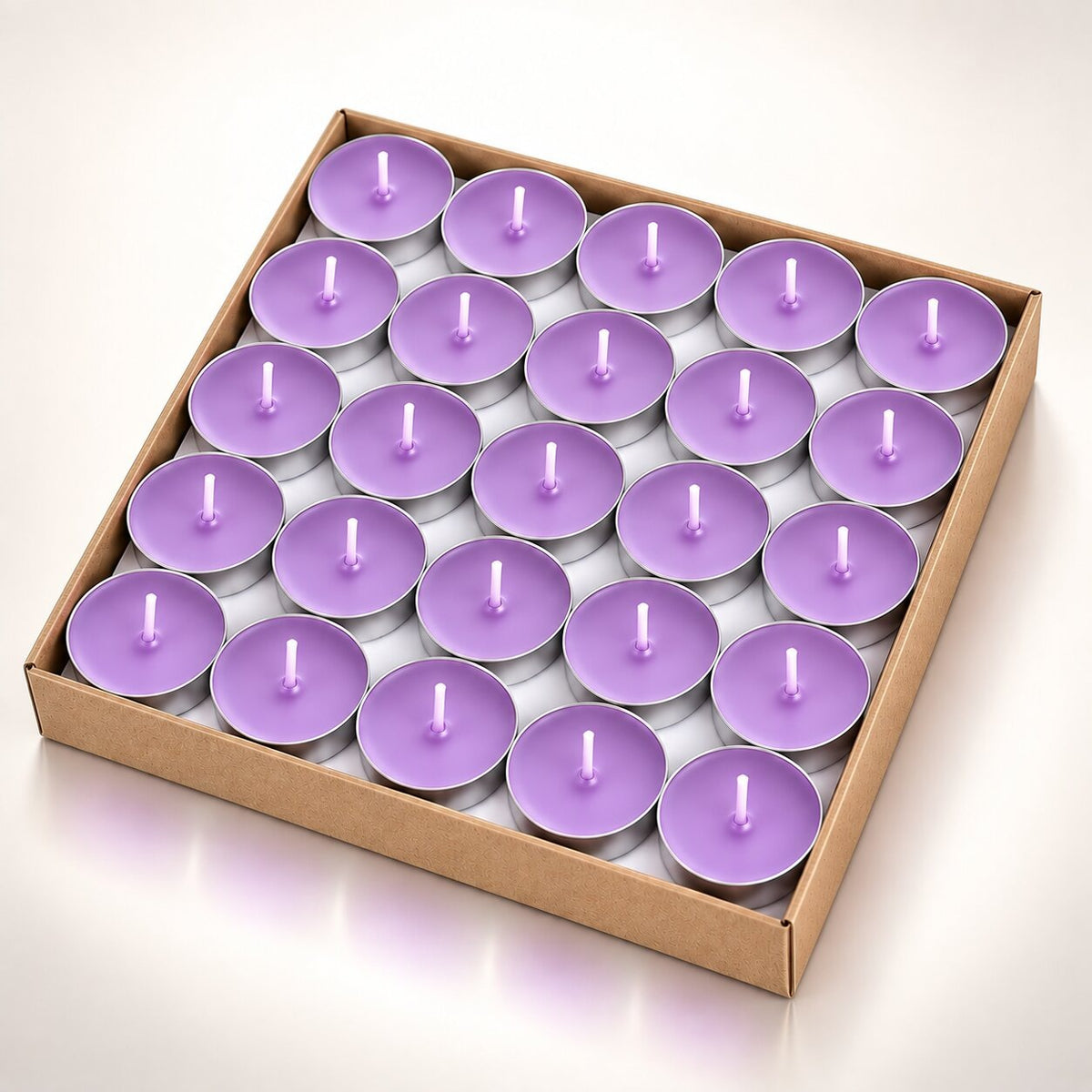 Coloured heart-shaped and round tea lights in cardboard boxes - lilac