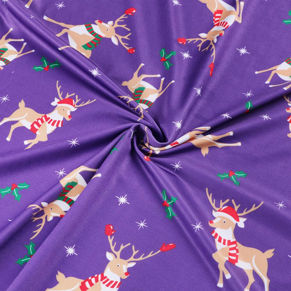 Women's printed jersey Christmas skater dress with long sleeves and a full skirt