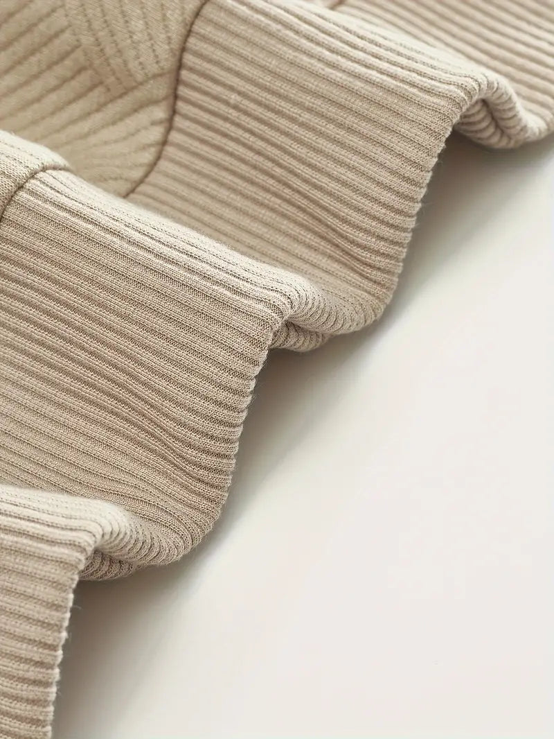 Woven diamond texture detail on the chest panel