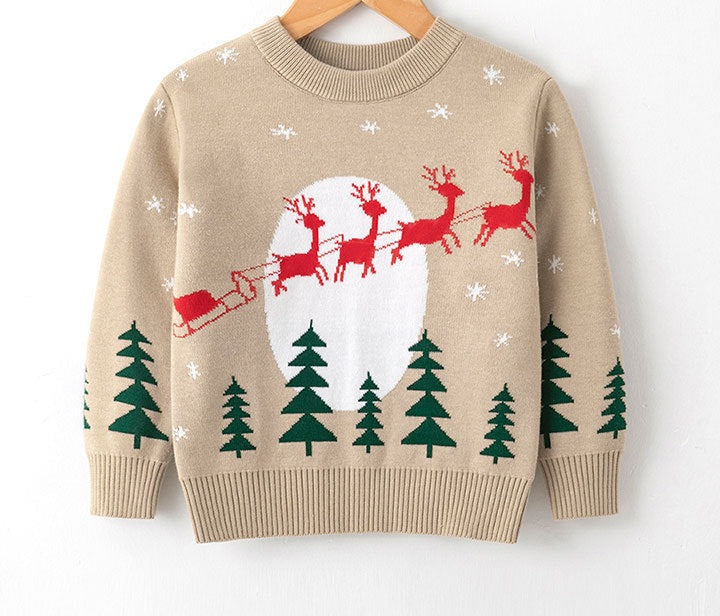 Kids' knitted Christmas jumper with a festive motif on the front - beige sleigh
