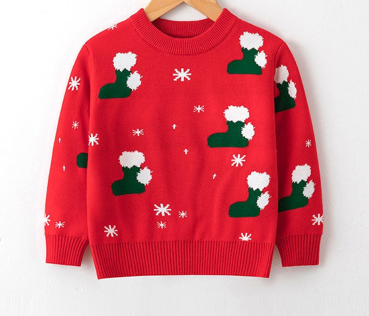 Kids' knitted Christmas jumper with a festive motif on the front - red stockings