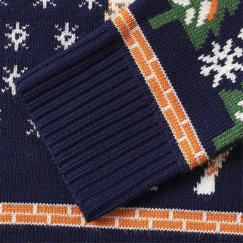 Kids' knitted Christmas jumper with a festive motif on the front
