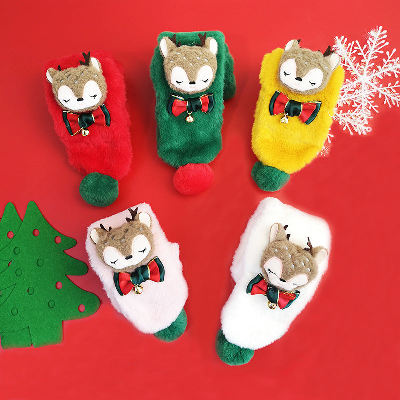 Kids' plush Christmas scarf with a reindeer head, bow and green pompoms