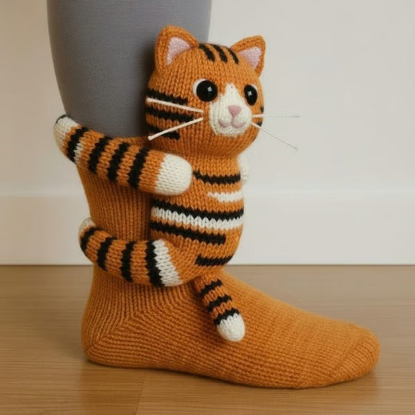 Knitted animal socks with a 3D animal hugging the leg - ginger cat