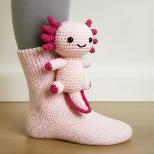 Knitted animal socks with a 3D animal hugging the leg - axolotl