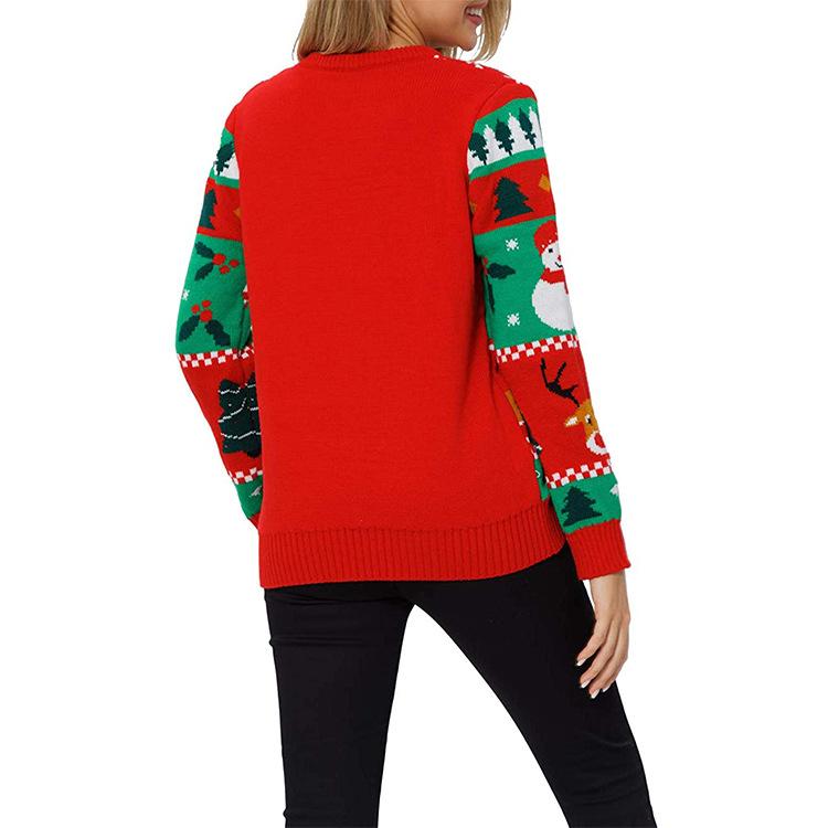Women's red knitted Christmas jumper with a festive motif and fairy lights