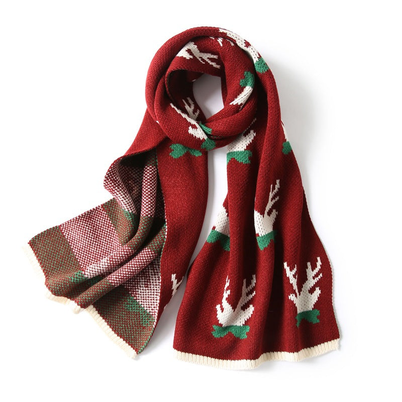 Knitted Christmas scarf with a knitted-in festive motif and ribbed ends - red antlers