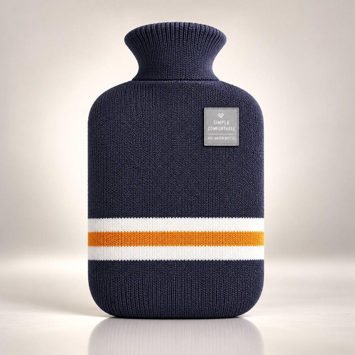 Knitted hot water bottle with stripes and a folded collar - navy