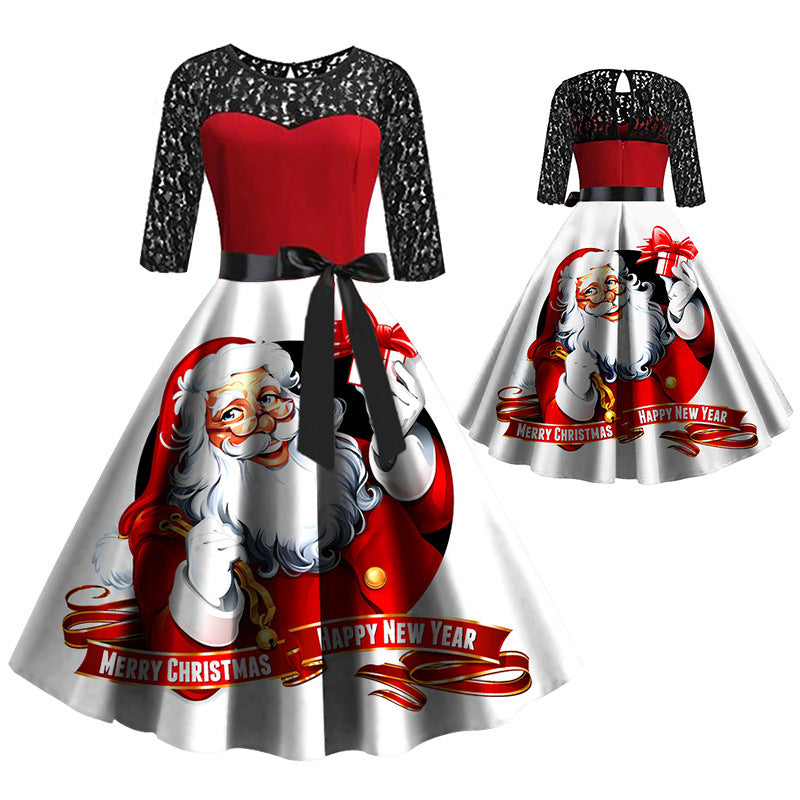 Women's Christmas dress with black lace sleeves, red bodice and Santa-print skirt
