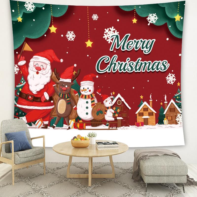 Large Christmas wall tapestry with a festive scene hanging above a sofa - santa and friends on red