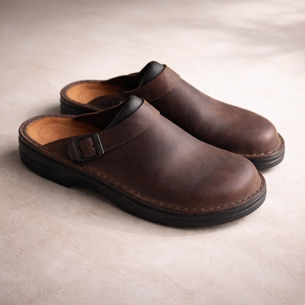 Leather-look slip-on clogs with a buckle strap for women and men - dark brown