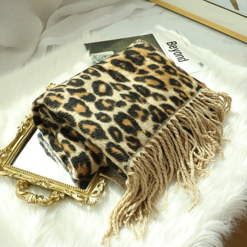 Women's woven leopard print scarf with twisted fringe