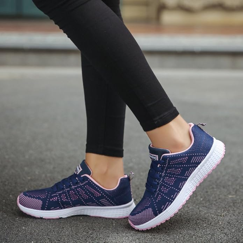 Women's lightweight knit trainers with a white foam sole