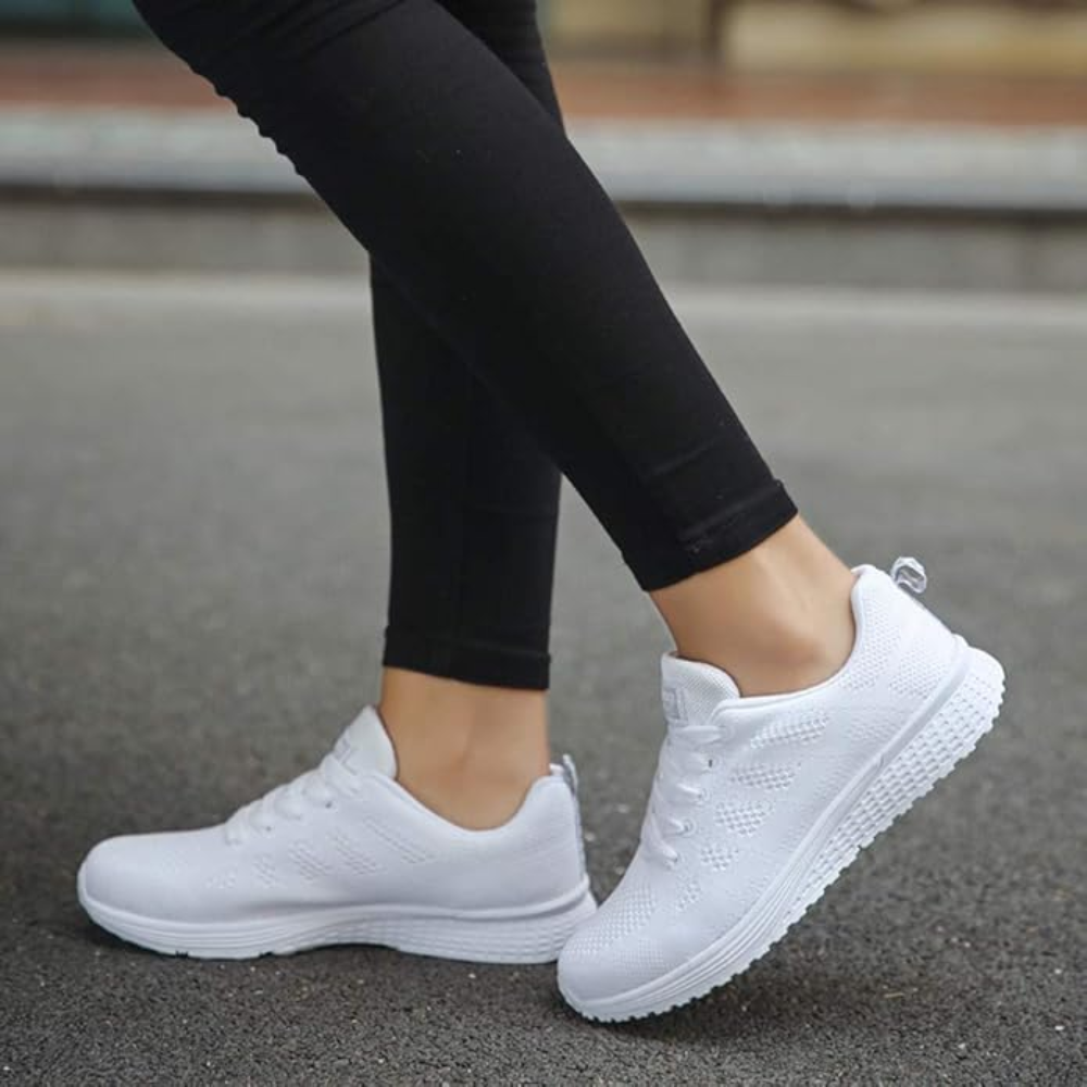 Women's lightweight knit trainers with a white foam sole