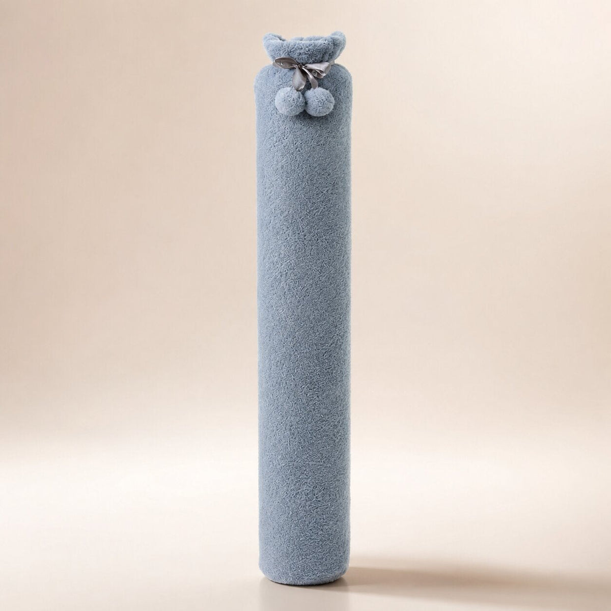 Long hot water bottle with a plush cover and pompoms, small or large - grey, large