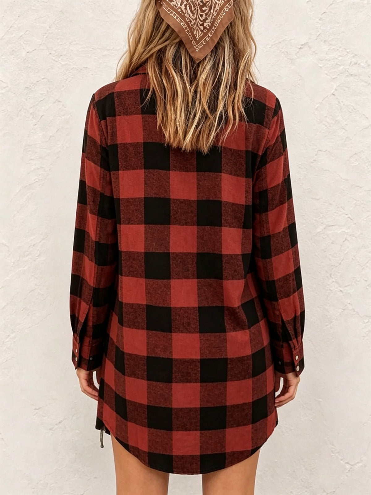 Longline check shirt for women in a large buffalo check with button front and curved hem