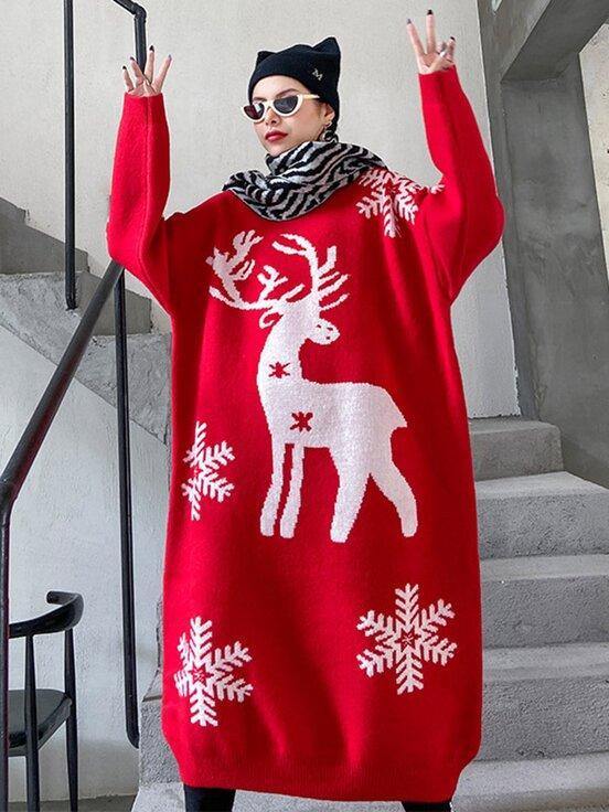 Women's longline oversized knitted Christmas jumper dress with a reindeer and snowflakes