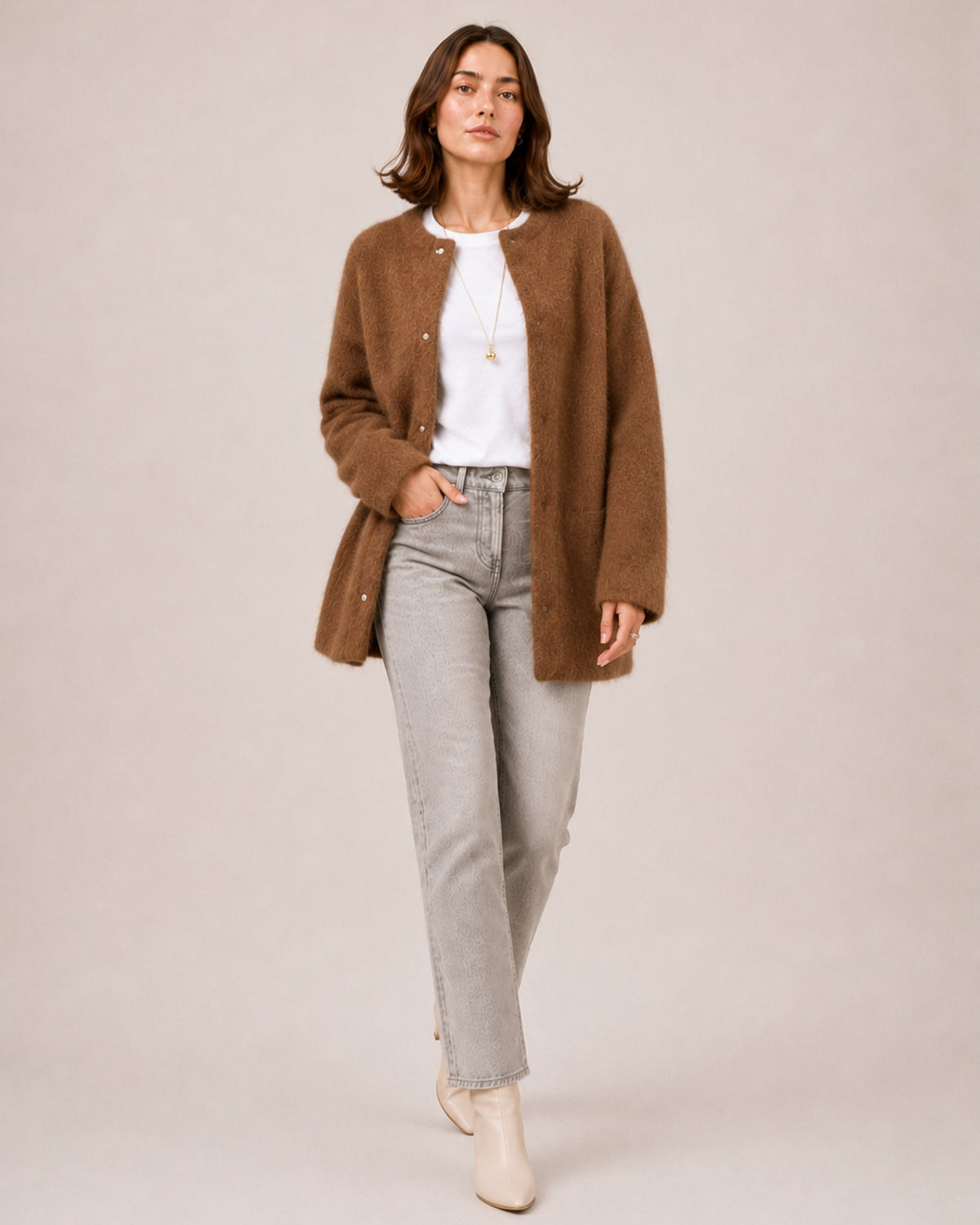 Women's longline fluffy cardigan with a round neck and side pockets - brown
