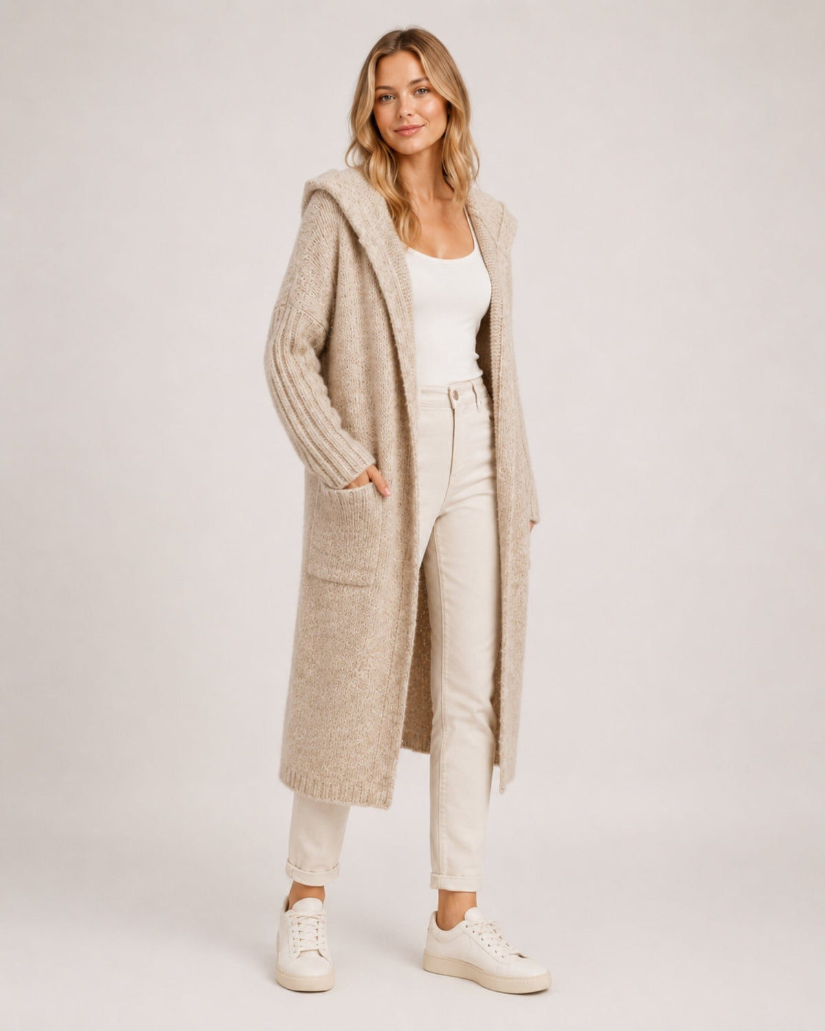 Women's longline hooded cardigan with an open front and patch pockets