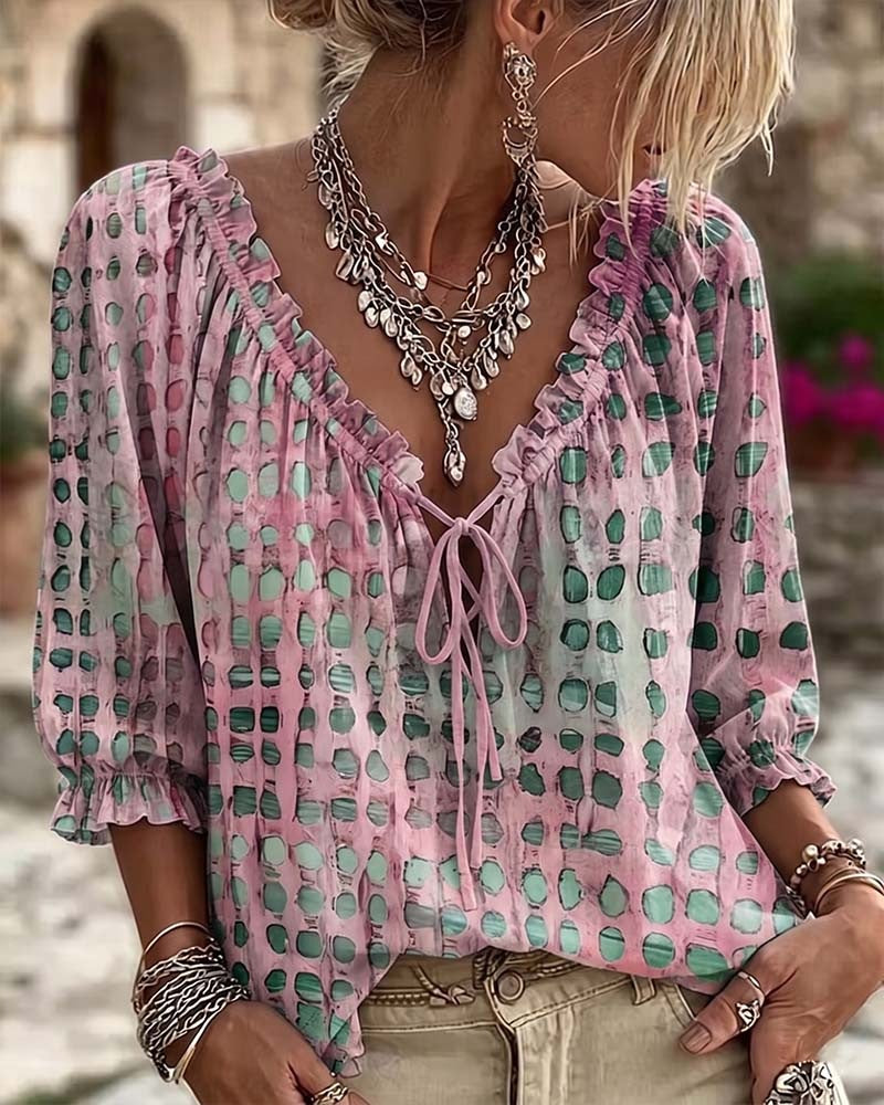 Loose polka dot blouse with a ruffled V-neck and tie cord - pink and green