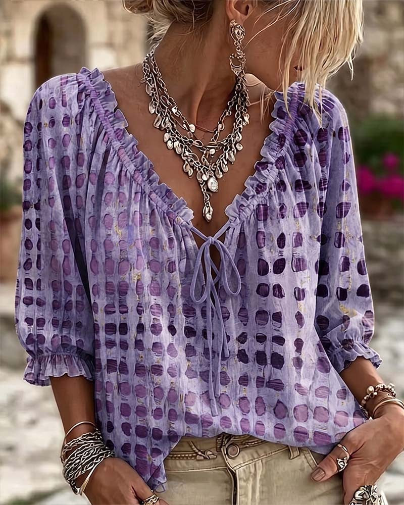 Loose polka dot blouse with a ruffled V-neck and tie cord - purple
